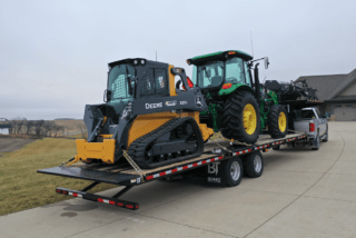Behnke Trailer loaded with agriculture equipment
